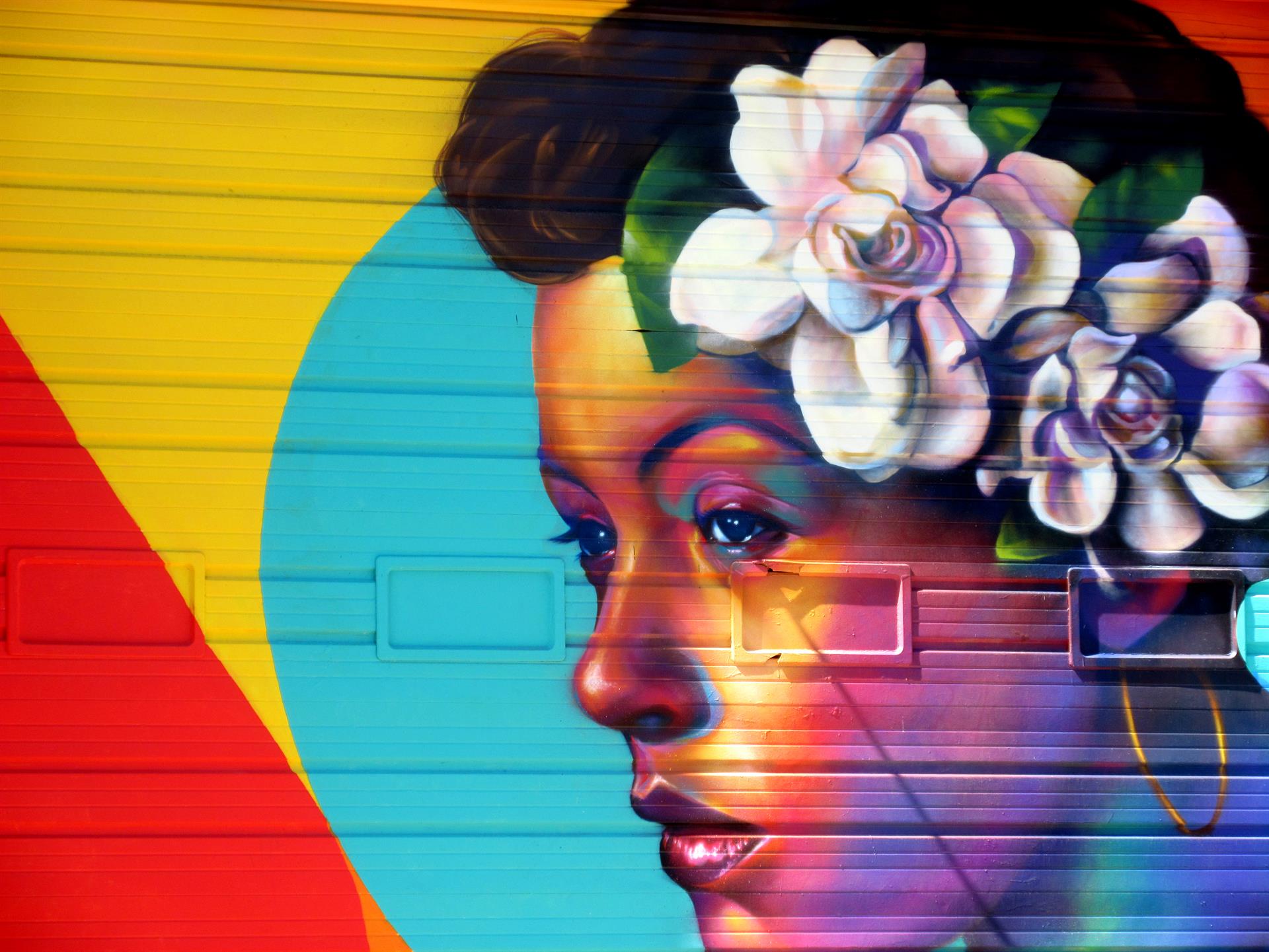 Vista de un detalle del mural realizado por Carmen Richards en colaboración con el colectivo de artistas Detour 303 que exhibe la presencia afroamericana y afrolatina en el barrio Five Points pintado en una pared del Denver Center Market en el norte del centro de Denver en Colorado. EFE/Francisco E. Miraval
