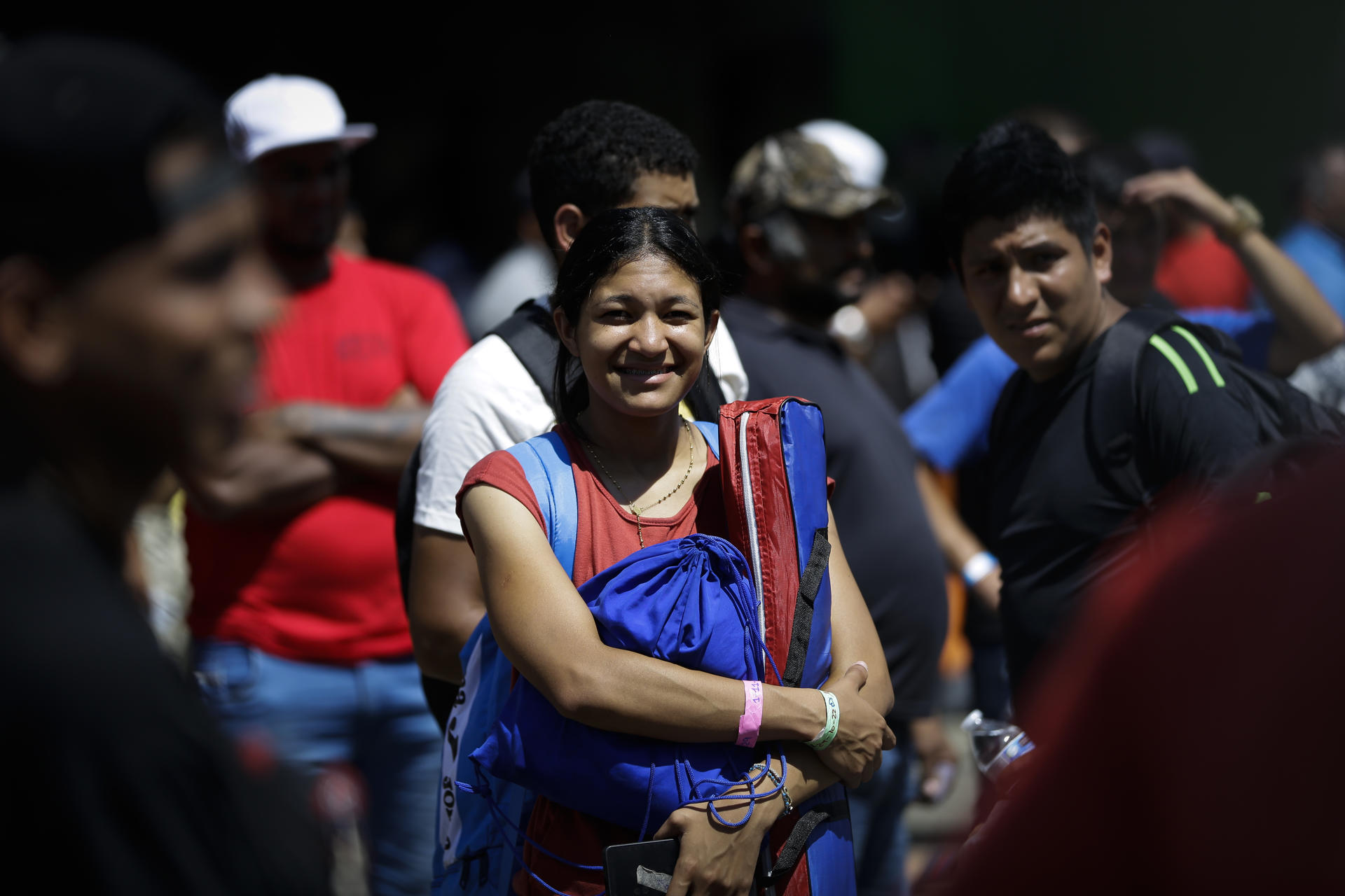 Fotografía de archivo que muestra a varias  personas migrantes de origen venezolano. EFE/ Bienvenido Velasco
